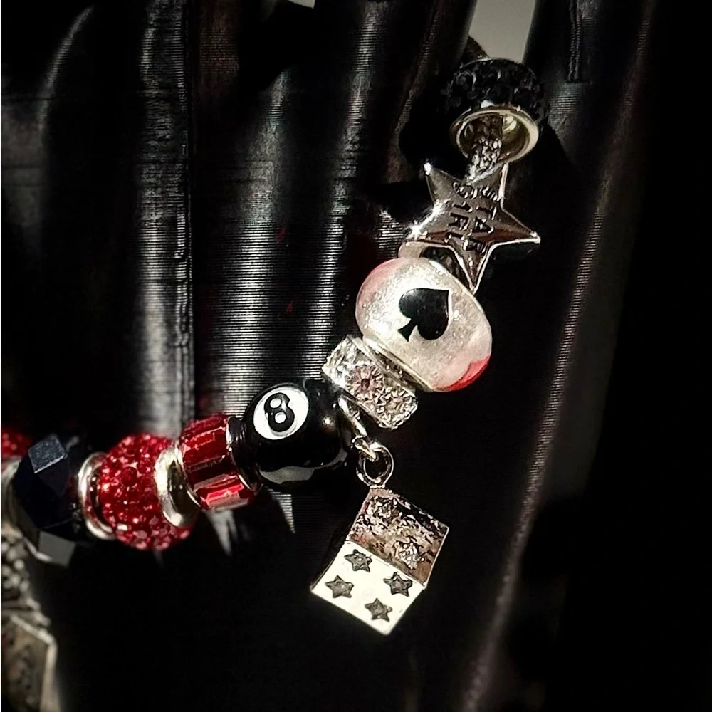 Elegant Charm Bracelet with Red and Black Accents